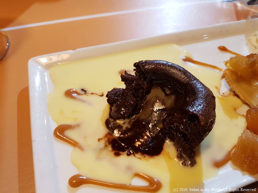 Melted chocolate fondant for dessert at Le Mouton Blanc in Mont Saint Michel - Sehee in the World blog