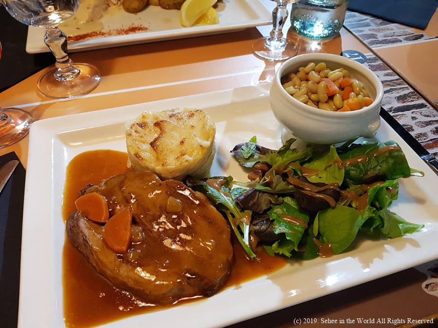 Roasted lamb for the main dish at Le Mouton Blanc in Mont Saint Michel - Sehee in the World blog