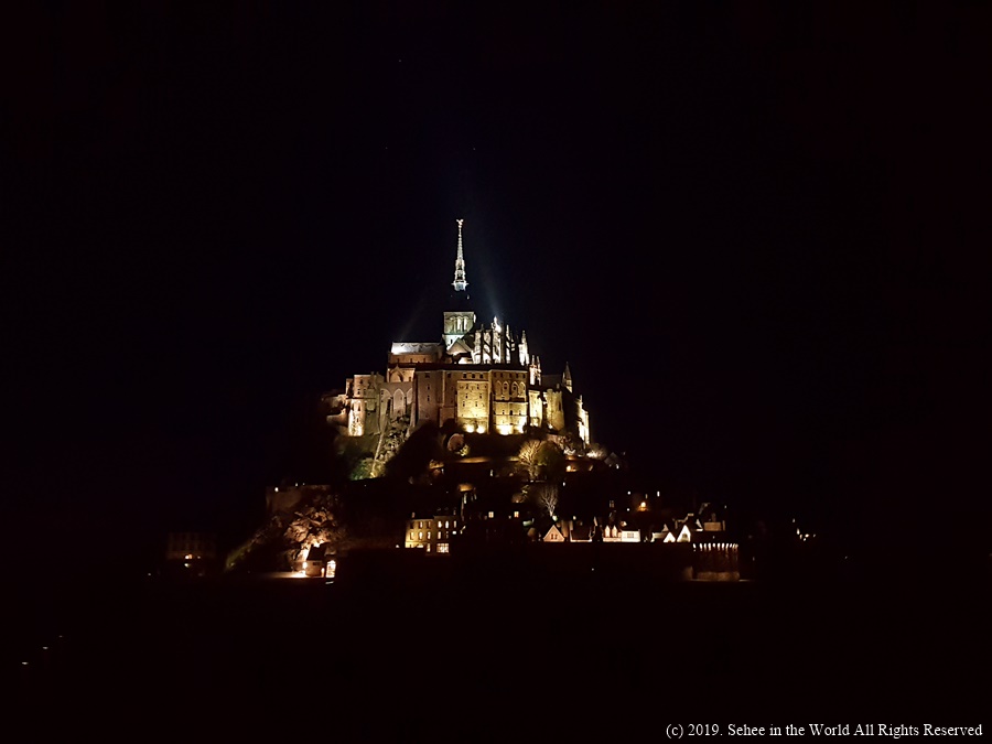View of Mont Saint Michel at night as we hopped off the shuttle bus - Sehee in the World blog