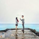 Me and Josh holding an umbrella at Jumunjin Breakwater: our take on the scene from K-drama Goblin (Guardian), watermarked -Sehee in the World