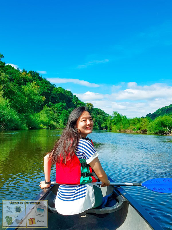 Me looking backwards on the canoe as we slowed down for photos and views, as the River Wye's landscape was picturesque. Image taken by Josh - Sehee in the World